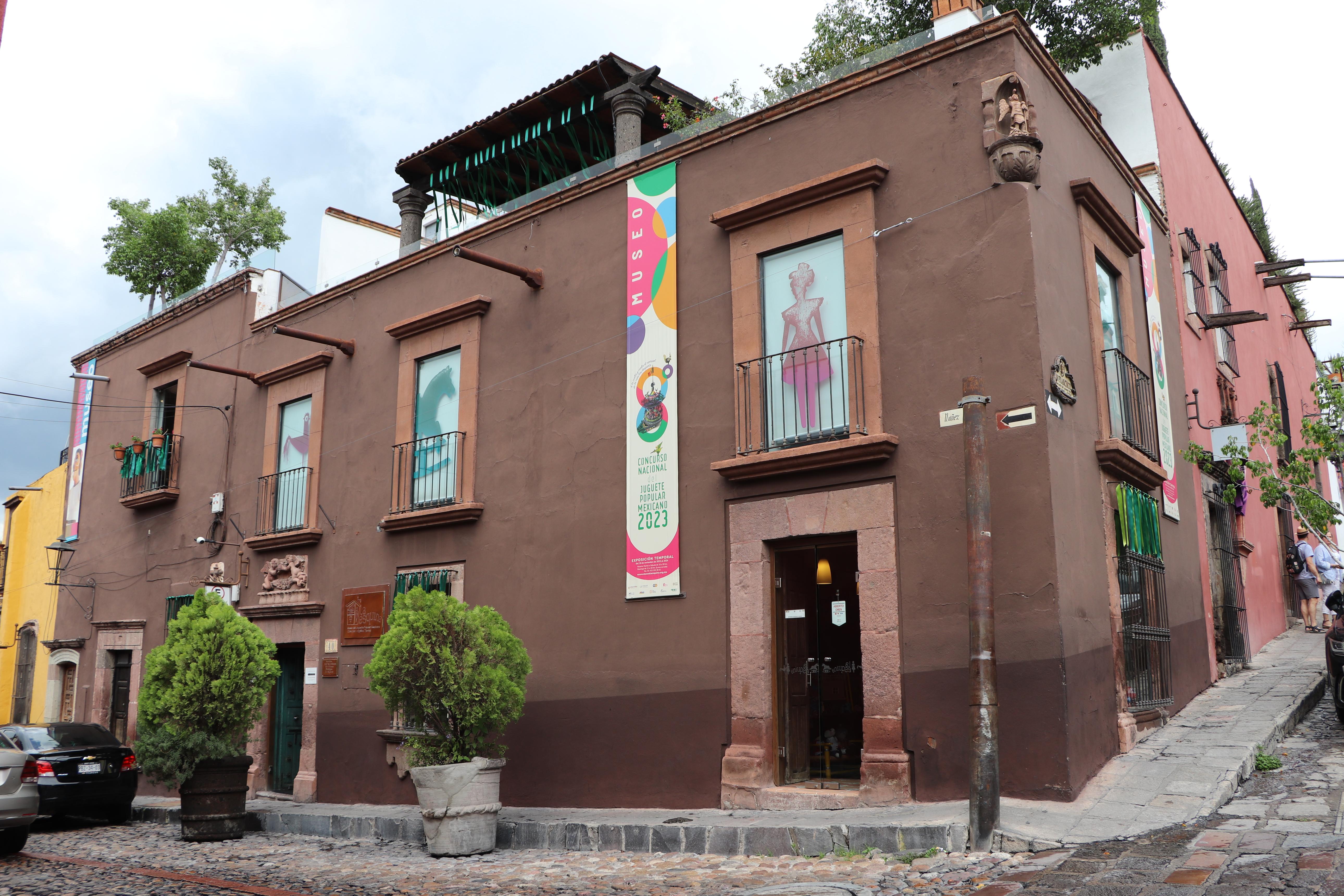 Colorful folk toys on display at La Esquina museum